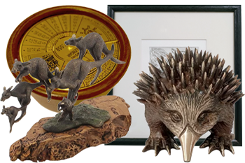 Featured Australian Gift Collection Australian-themed gift items including kangaroo sculpture, echidna figurine, decorative plate, and framed artwork